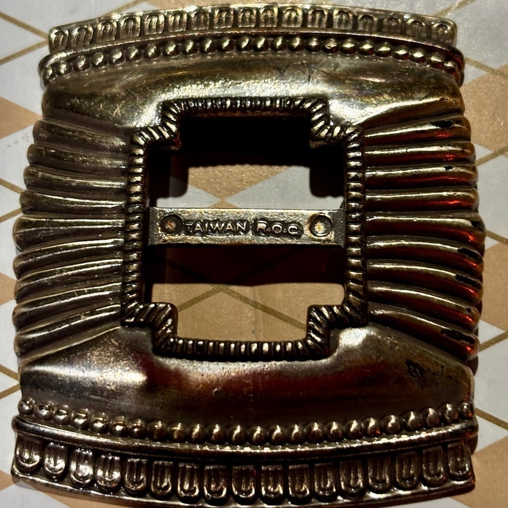 Vintage R.O.C. Taiwan silver tone reticulated Belt Buckle 1994